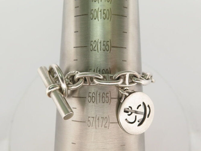 Bracelet vintage bracelet HERMES chaine d'ancre breloques marines t16 en argent 925 58 Facettes 267839