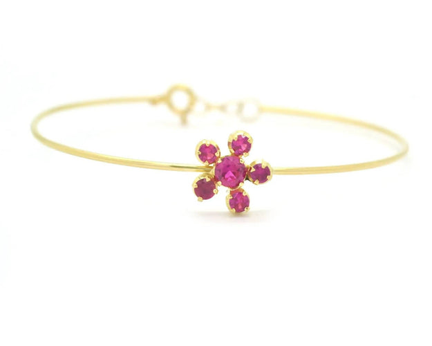 Bracelet Bracelet rigide en or jaune avec rubis synthétiques 58 Facettes 8426