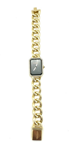 Montre CHANEL. Collection "Première chaine gourmette", montre en or jaune 18K 58 Facettes