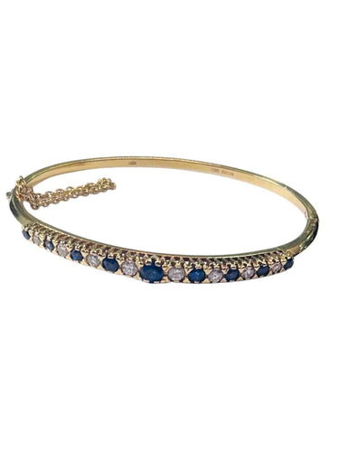 Bracelet Bracelet rigide en or jaune, diamants et saphirs 58 Facettes 259009