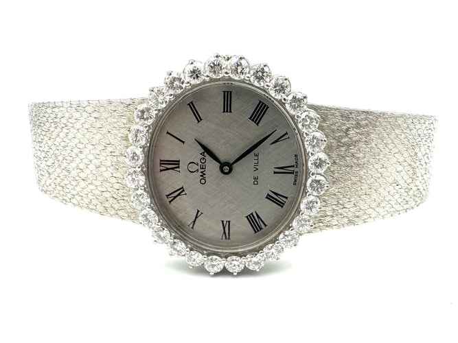 Montre OMEGA. Collection "De Ville", montre de dame vinatge or et diamants 58 Facettes