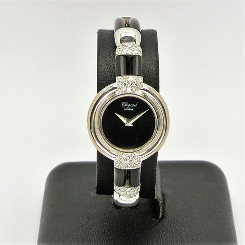 Montre Montre Chopard Genève en or blanc 18 carats avec onyx et diamants 58 Facettes