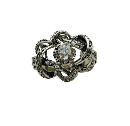 Bague Bague en or blanc avec diamant central et diamants sertis pavé 58 Facettes 50092