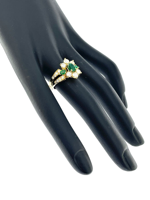 Yellow gold cocktail ring with emeralds and diamonds
