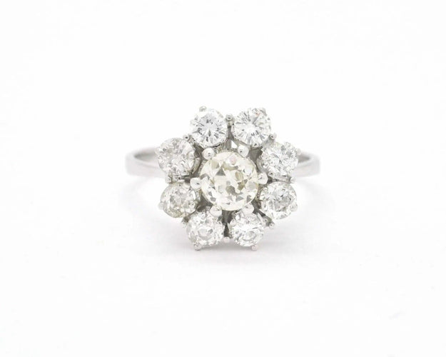 Bague Bague en or blanc avec un diamant central de 0,70 ct et des diamants d'accompagnement 58 Facettes 8056