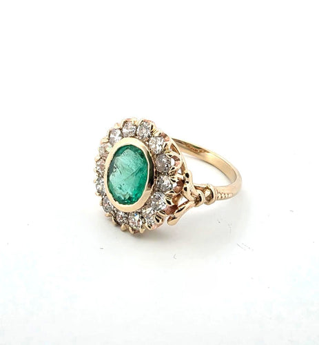 Anello in oro giallo e argento con smeraldo e diamanti 