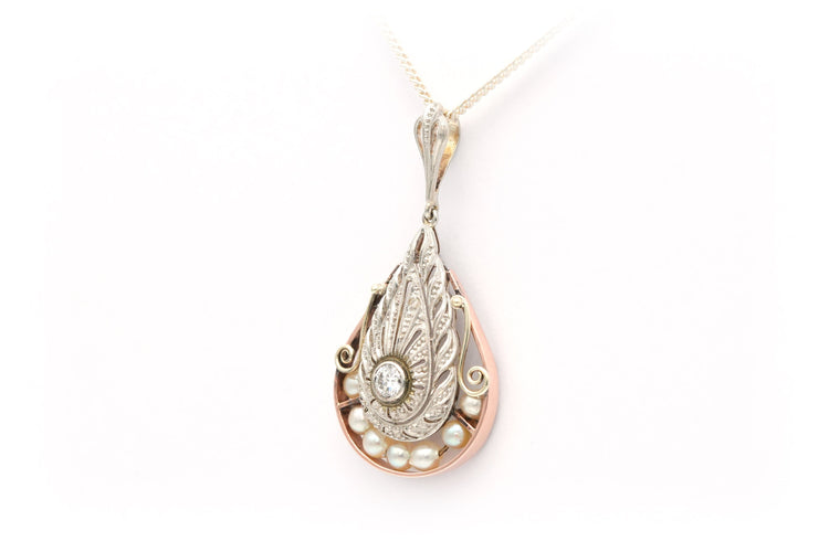 Pendentif Pendentif Art Déco en or rose et blanc serti de perles et d'un diamant 58 Facettes B644