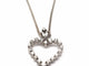 Collier Collier en or blanc 750 mil et pendentif cœur en diamants 58 Facettes