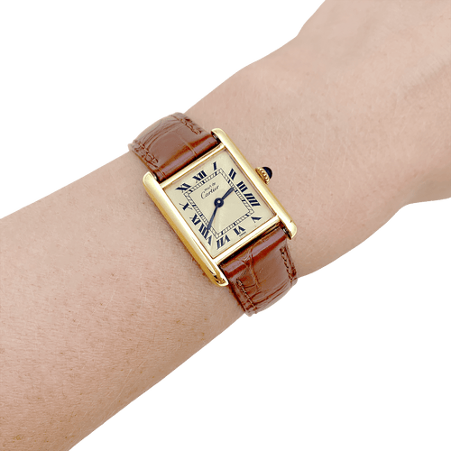 Montre Montre Cartier "Tank Must" argent plaqué or, cuir. 58 Facettes 34561