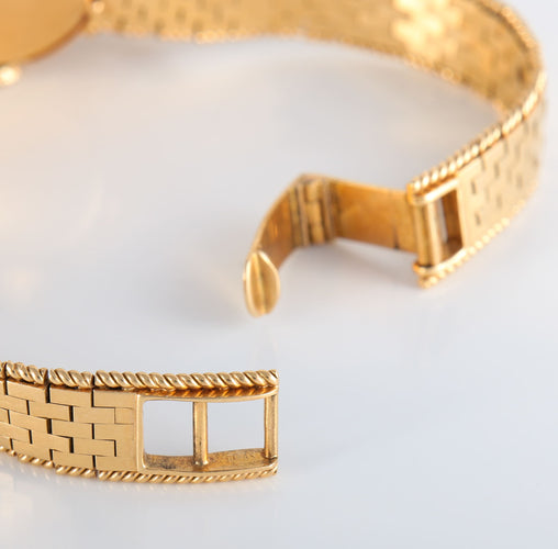 Montre Montre Rolex "dissimulée" or jaune diamants 58 Facettes