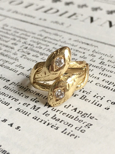 Bague 51 Bague ancienne en or jaune 18K représentant deux serpents 58 Facettes