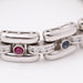 Bracelet bracelet en or blanc avec rubis, saphirs et zircons 58 Facettes E359465