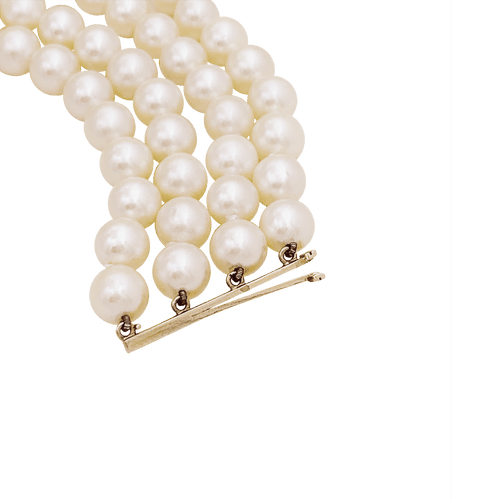 Bracelet Bracelet perles de culture 4 rangs, or jaune, saphirs. 58 Facettes 34535