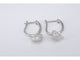 Boucles d'oreilles Boucles d'oreilles en or blanc serties de diamants en forme de cœur 58 Facettes 2174