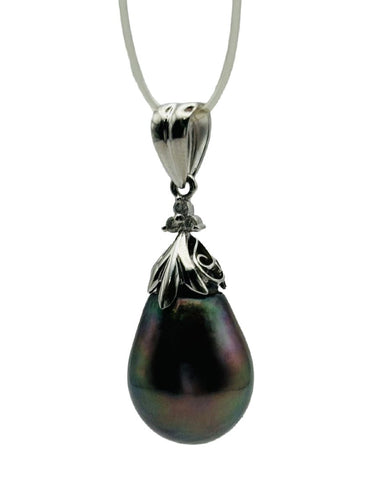 Pendentif Pendentif en or avec une perle de Tahiti en forme de larme 58 Facettes 50183