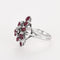Bague 56 Bague vintage "panier" en or blanc, diamants et rubis. 58 Facettes