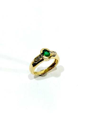 Bague 51 Bague or jaune, émeraude et diamants 58 Facettes