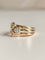 Bague 52.5 VAN CLEEF & ARPELS Bague trois cœurs en or trois couleurs 18k 58 Facettes