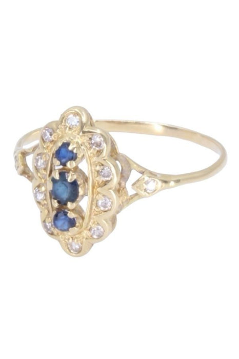 MARQUISE SAPPHIRE AND DIAMOND RING