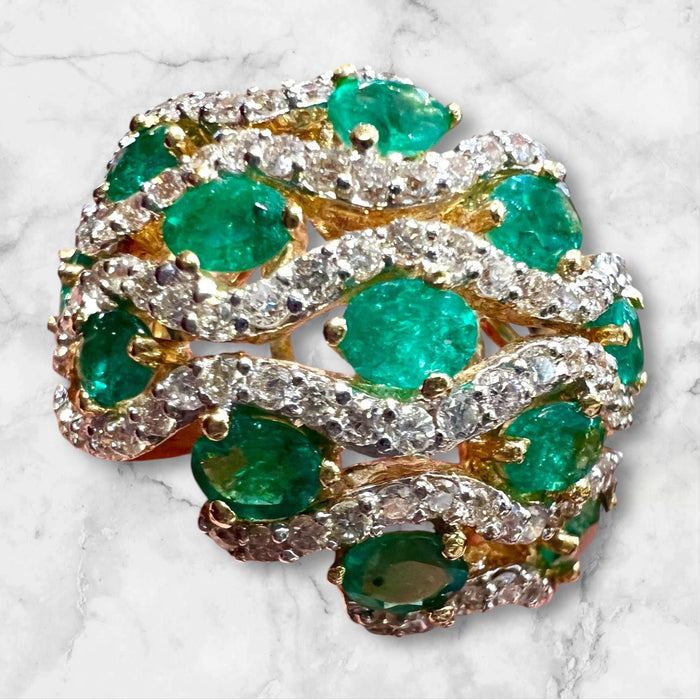 yellow gold ring with emeralds and diamonds