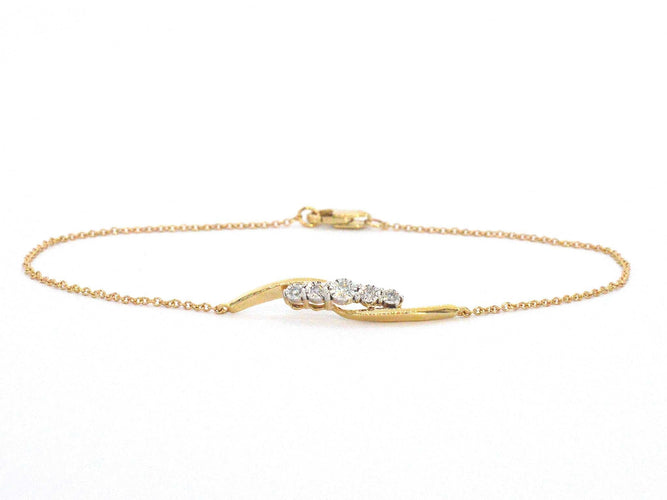 Bracelet Bracelet en or jaune avec diamants sertis en rang 58 Facettes 2361