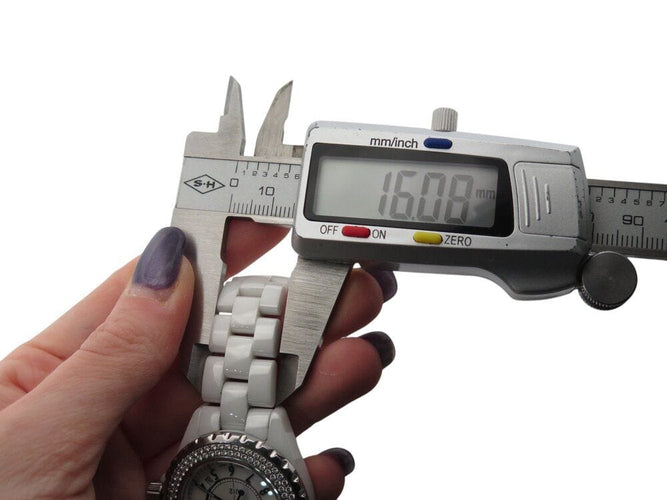 Montre montre CHANEL j12 34 mm h0967 112 diamants ceramique blanche quartz 58 Facettes 268147