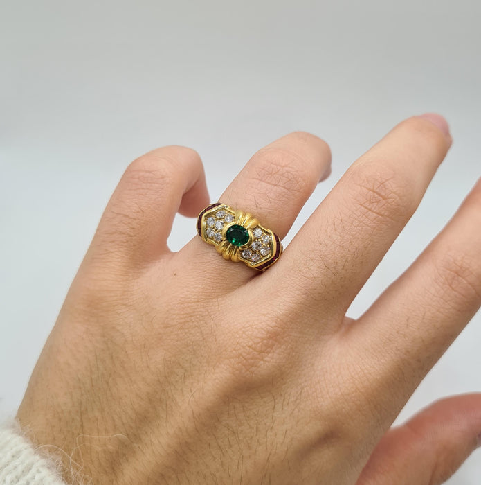 Yellow gold ring set with emerald, diamonds and rubies