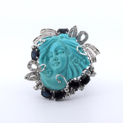 Bague 59 Bague sculptée en saphir, diamant et turquoise 58 Facettes