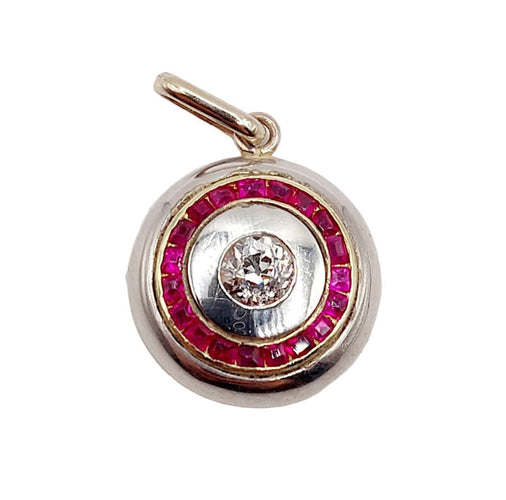 Pendentif Pendentif cible art deco or 18k et platine, diamant taille ancienne et rubis synthétiques calibrés (circa 1920) 58 Facettes A05895