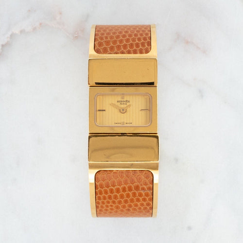 Montre Hermès - Montre Loquet cadran champagne en acier plaqué or 58 Facettes