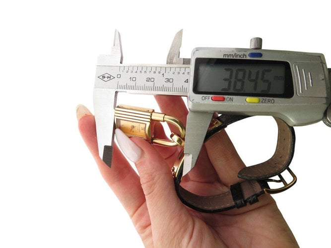 Montre montre vintage HERMES Kelly Mini Cadenas 20 mm plaque or quartz dame 58 Facettes 268902