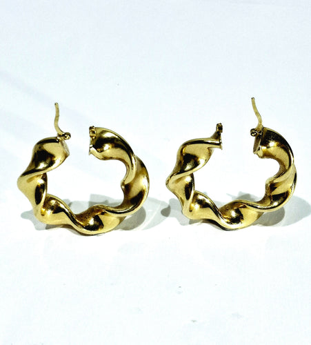 Boucles d'oreilles Paire de créole torsadées en or 58 Facettes