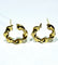 Boucles d'oreilles Paire de créole torsadées en or 58 Facettes
