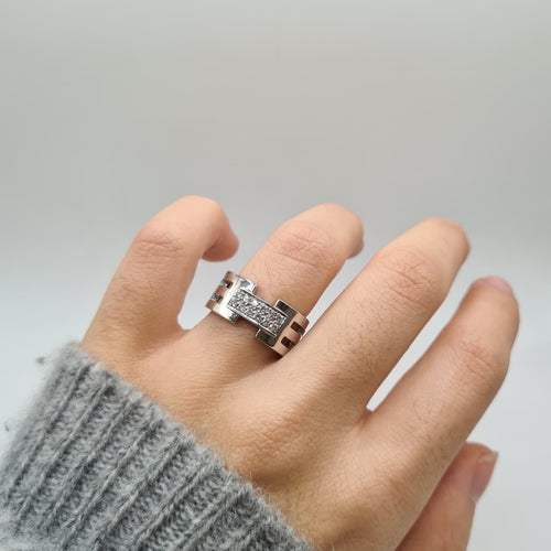 Bague 54 Bague or blanc sertie de diamants 58 Facettes