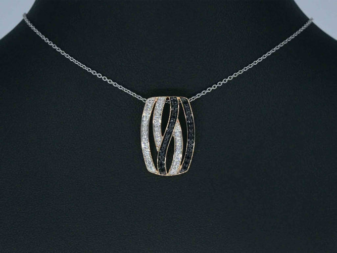 Pendentif Pendentif design en or rose avec diamants brillants blancs et noirs 58 Facettes 2245