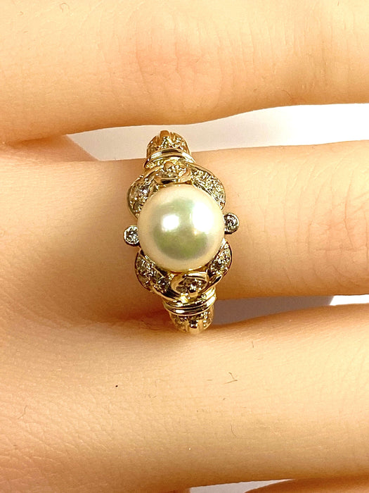 Bague 52 Bague or jaune, perle et 38 diamants 58 Facettes AB448