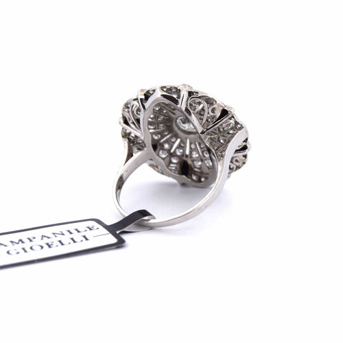 Bague Bague en or blanc ornée d'un travail ajouré spécial 58 Facettes