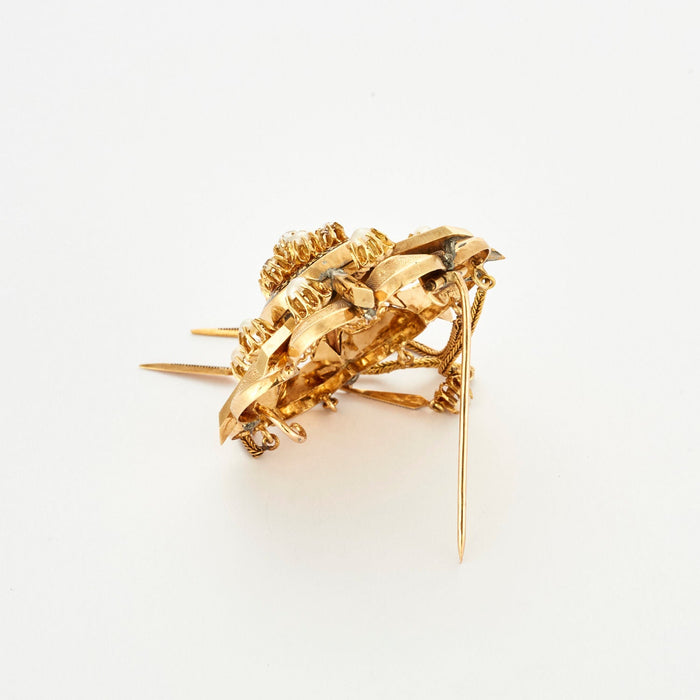 Yellow gold guilloché brooch with diamonds
