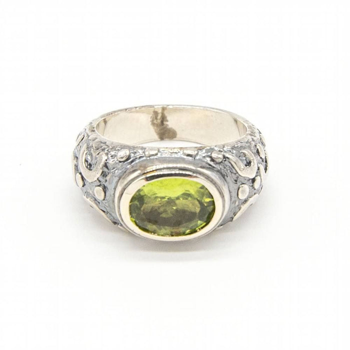 Ring aus Gold, Silber und Peridot