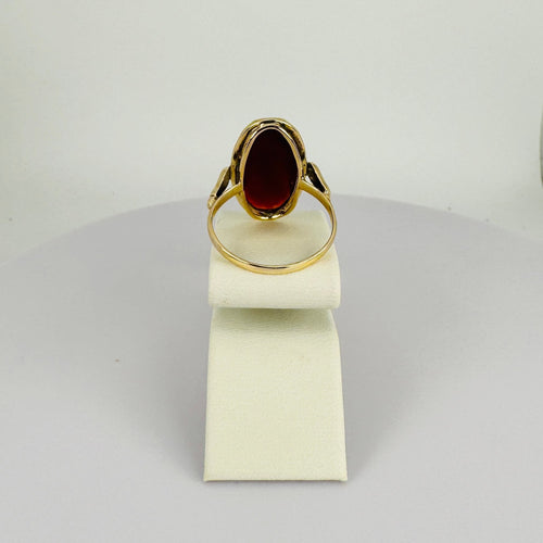 Bague Bague solitaire en or jaune, cabochon ovale en cornaline facettée de 8 carats 58 Facettes 2501102