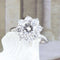 Bague Bague rosette avec diamant central et halo de diamants en or blanc 18 carats 58 Facettes 136043