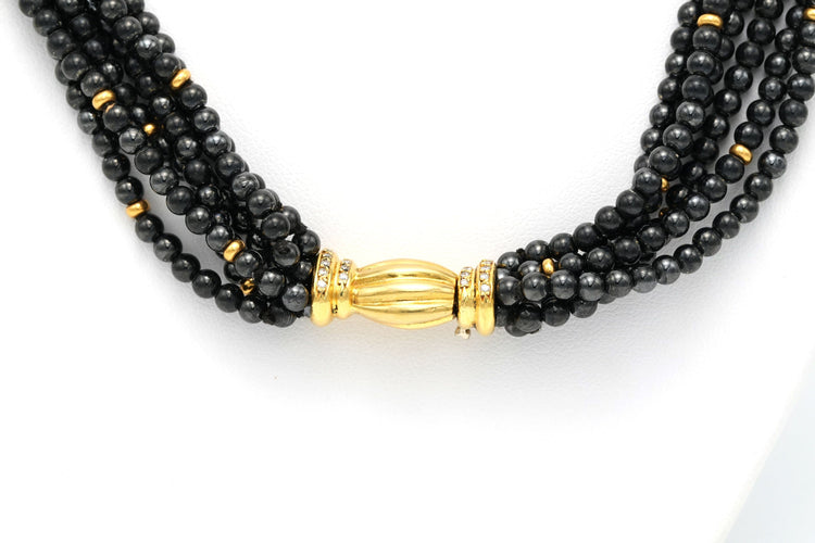 Collier Collier en perles d'hématite, diamants et or jaune 58 Facettes 13822