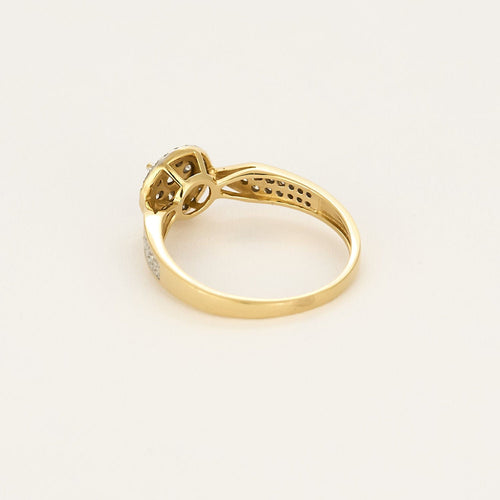 Anello in oro giallo e oro bianco con motivo floreale, diamanti 