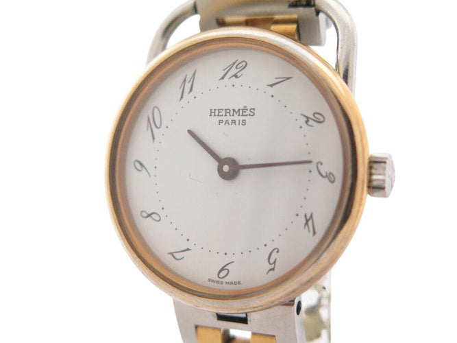 Montre vintage montre HERMES arceau 25 mm acier et plaque or quartz  plated 58 Facettes 268618