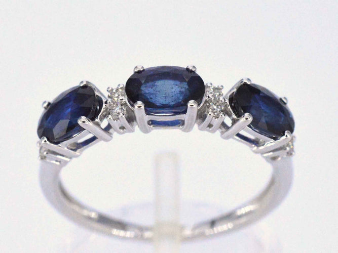 Bague Bague en or blanc avec diamants et saphir 58 Facettes 2122