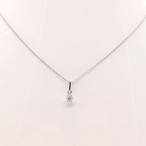 Collier Collier en or blanc serti d'un diamant de 0.15 carat 58 Facettes