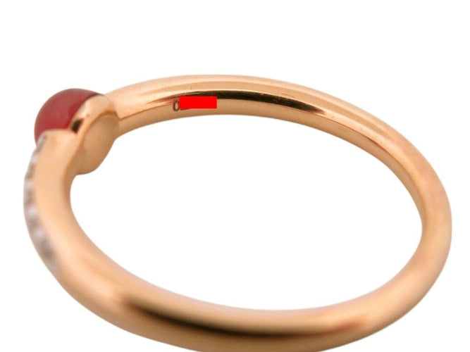 Bague 53 bague POMELLATO m'ama non m'ama grenat 53 diamants or jaune 18k 58 Facettes 268365