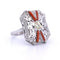 Platinring mit Diamanten und Korallen 