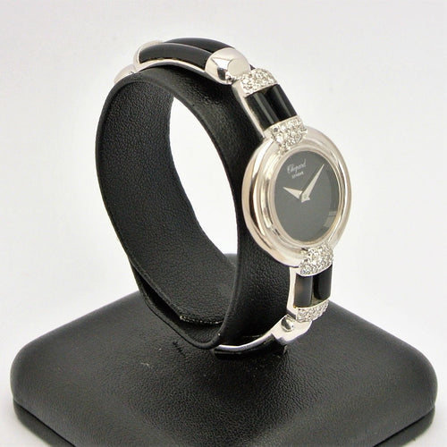 Montre Montre Chopard Genève en or blanc 18 carats avec onyx et diamants 58 Facettes