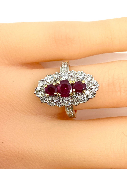 Marquise ring in gold, diamonds and rubies.